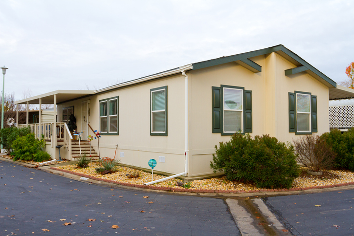 A new manufactured home at a retirement trailer park living in a mobile mobile home community