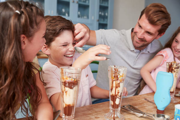 Father Making Ice Cream Sundaes