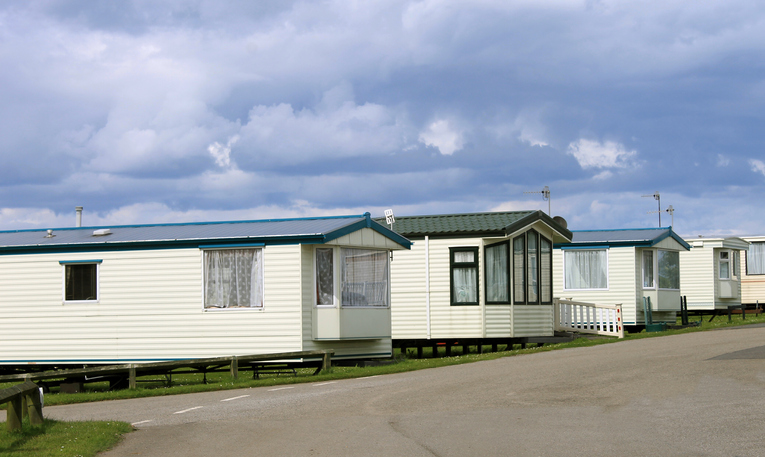 Row of caravan trailers homes for sale