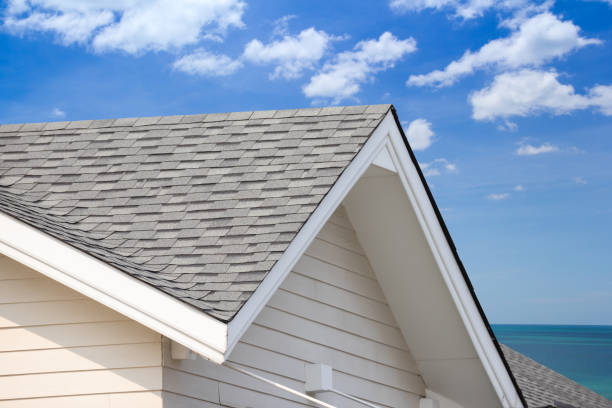 grey roof shingle with blue sky background